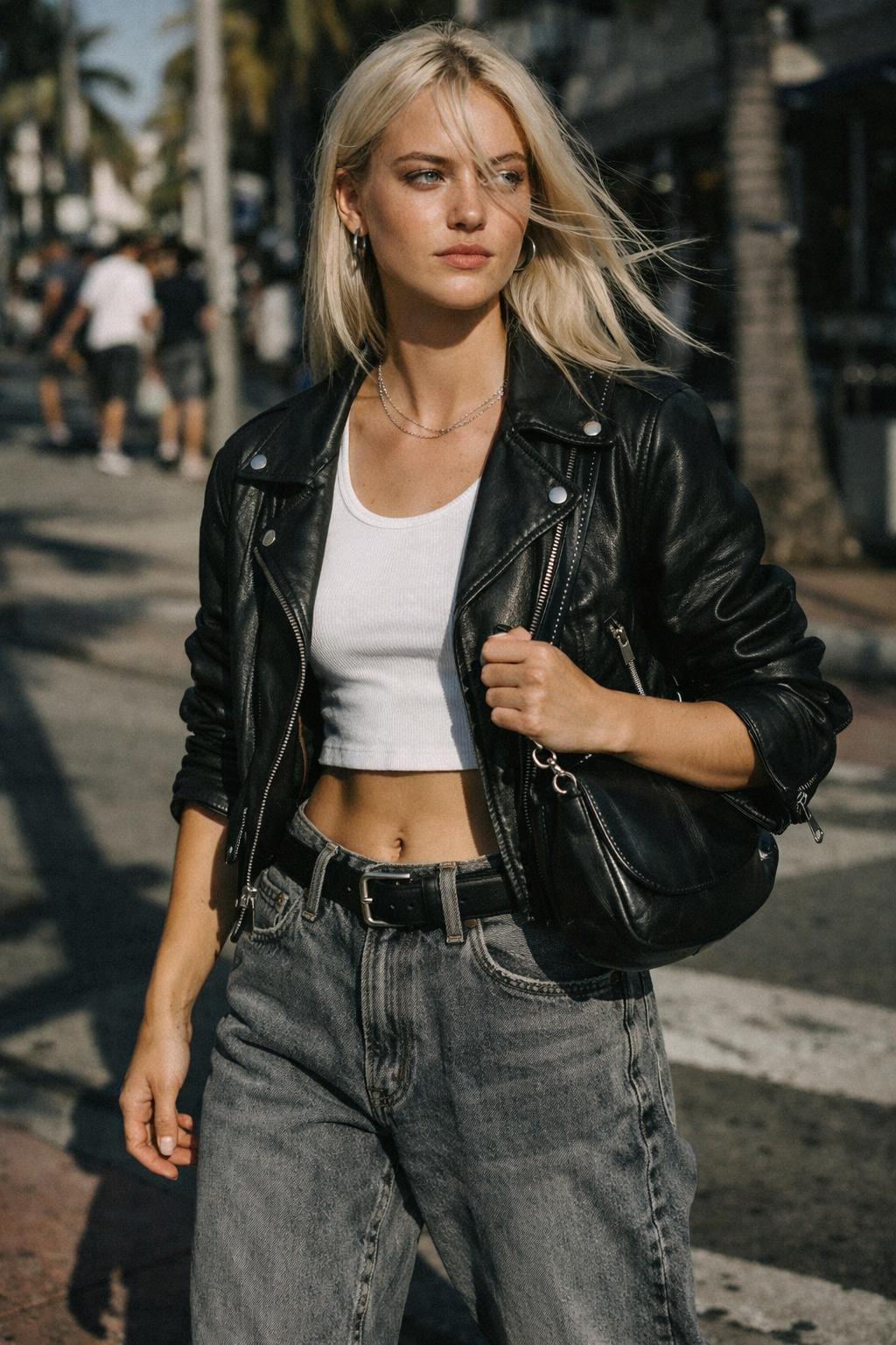 Grey baggy jeans outfit with black leather moto jacket