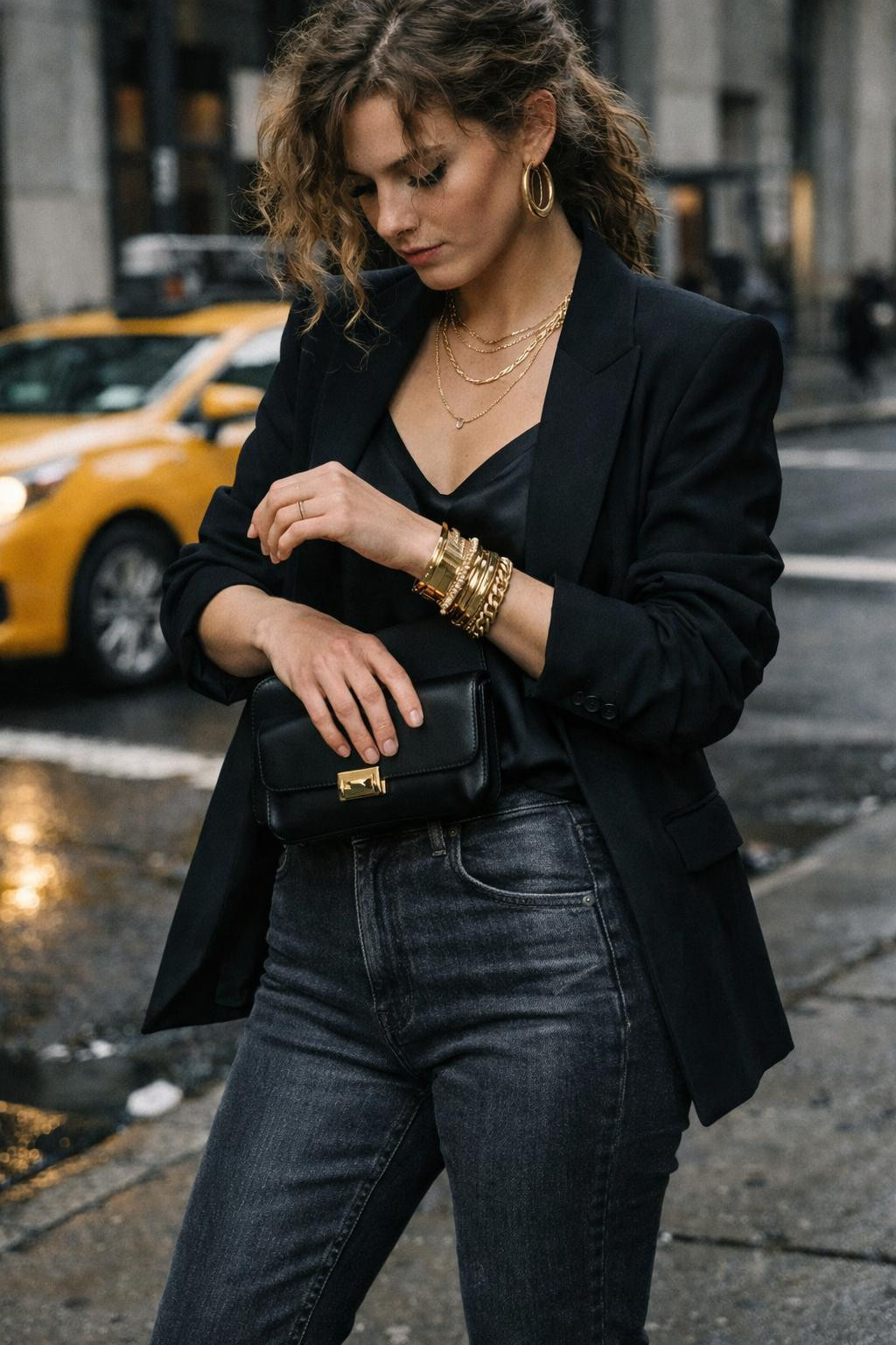 Grey jeans outfit with black blazer and gold jewelry