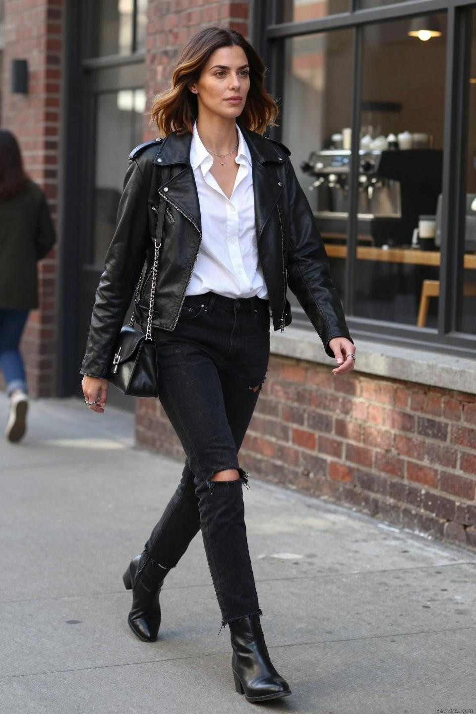 Black torn jeans outfit with white button-down coffee district lifestyle moment