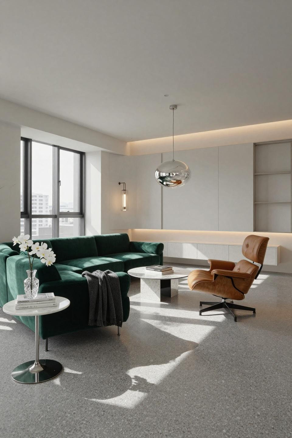 Small family room layout in Tokyo apartment with Minotti Andersen sofa and terrazzo