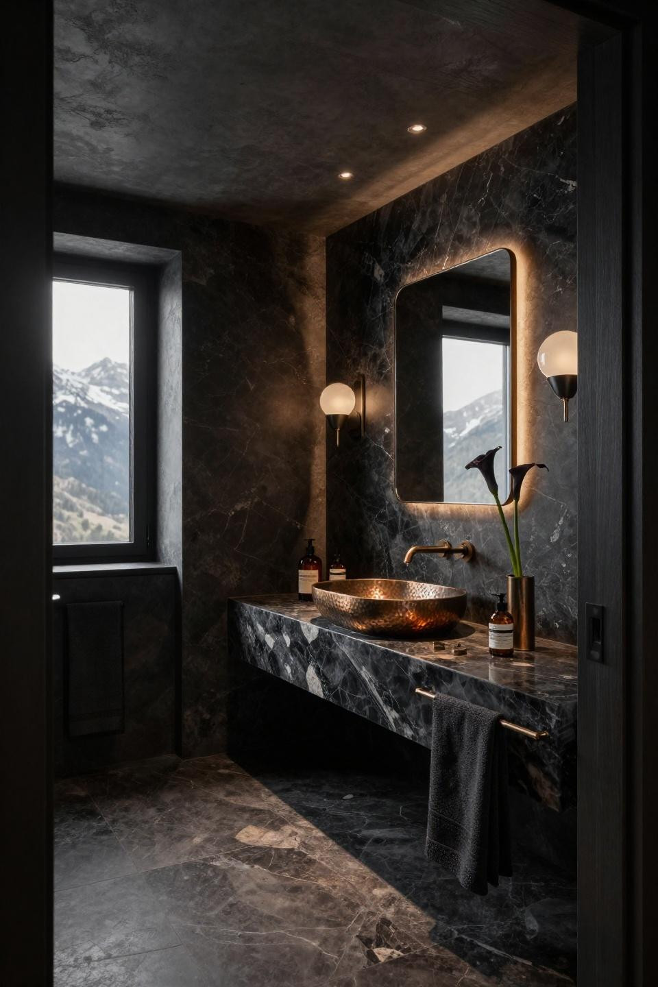 Moody half bathroom with book-matched travertine and bronze fixtures in Alpine chalet