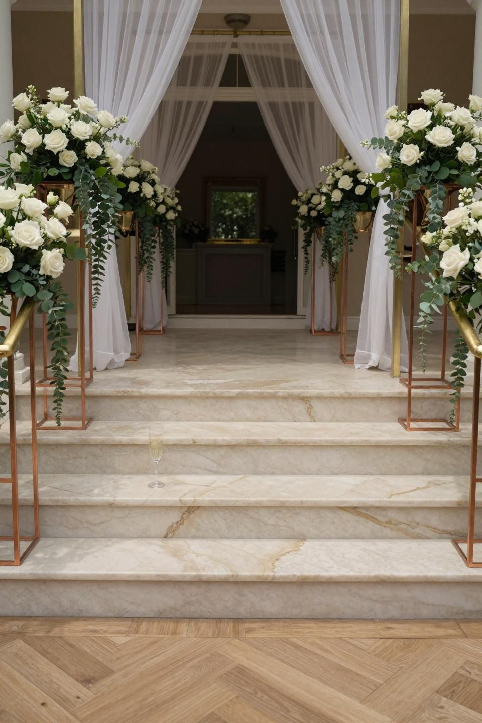 Backyard wedding aisle with copper planters and book-matched marble steps