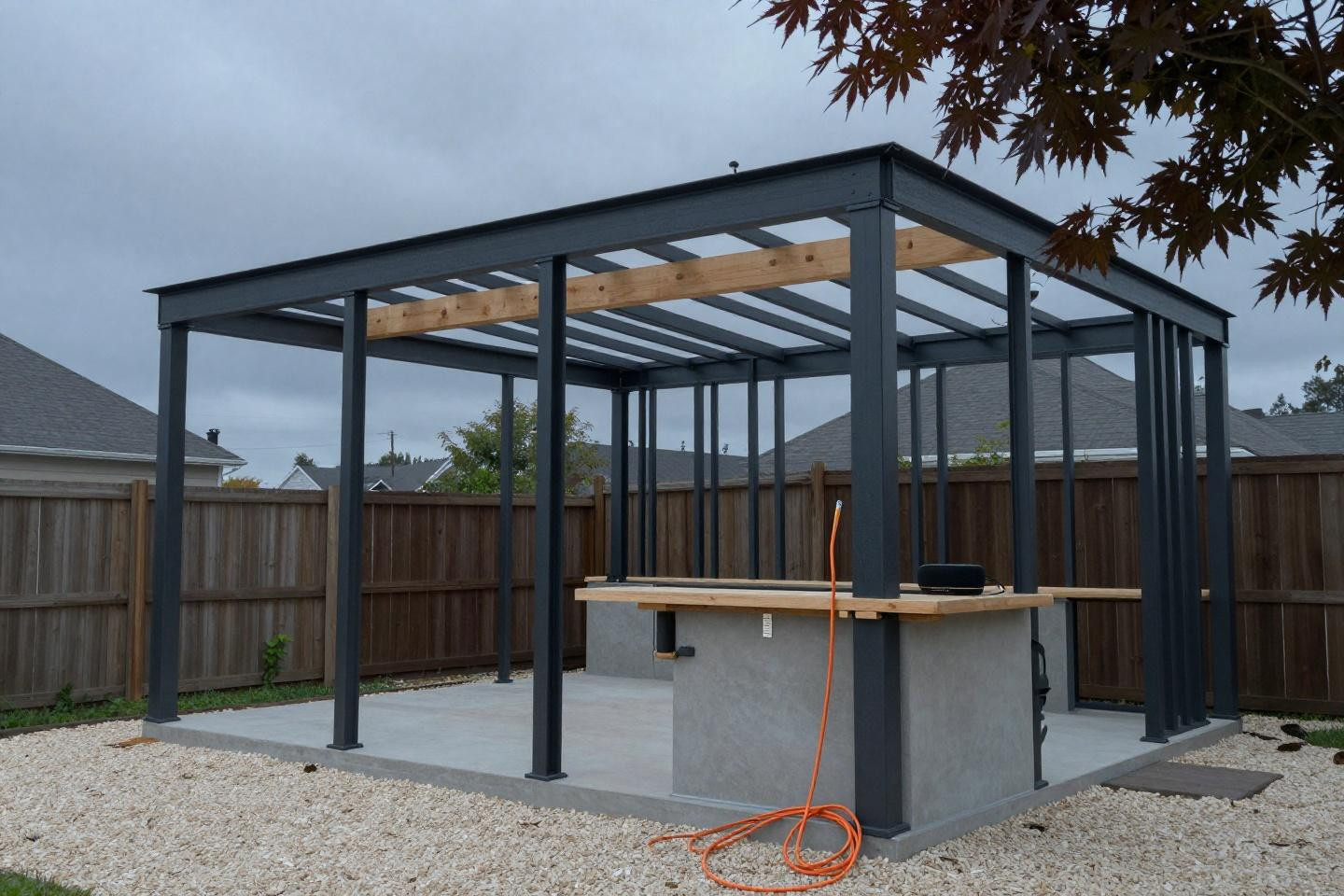 Semi-built modular steel frame outdoor kitchen pavilion showing structural skeleton