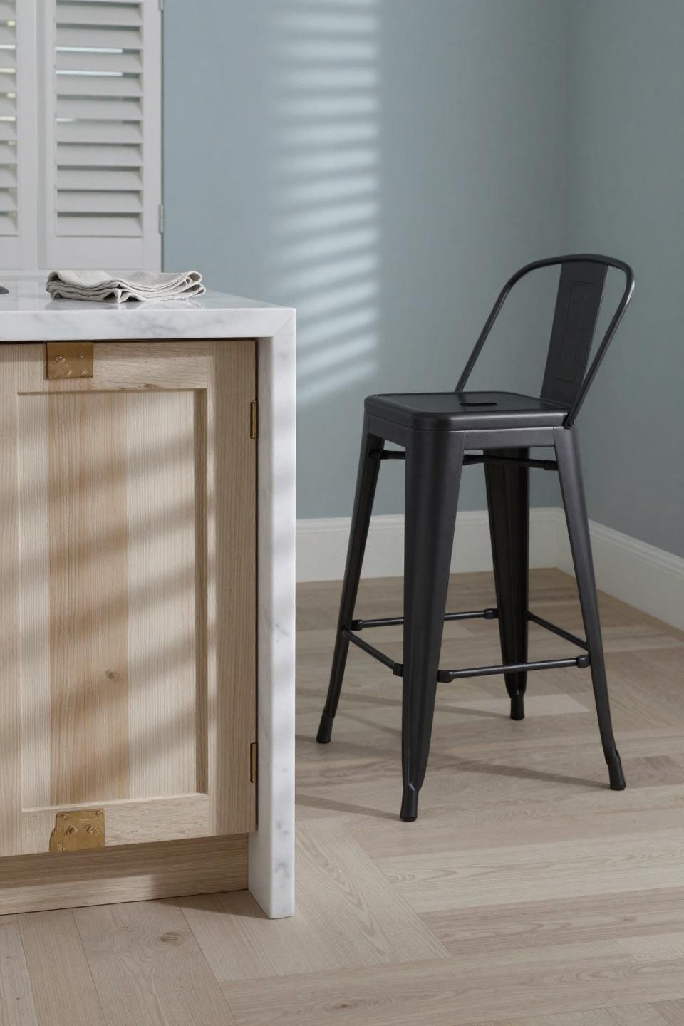 White oak floors kitchen in coastal style with marble waterfall island