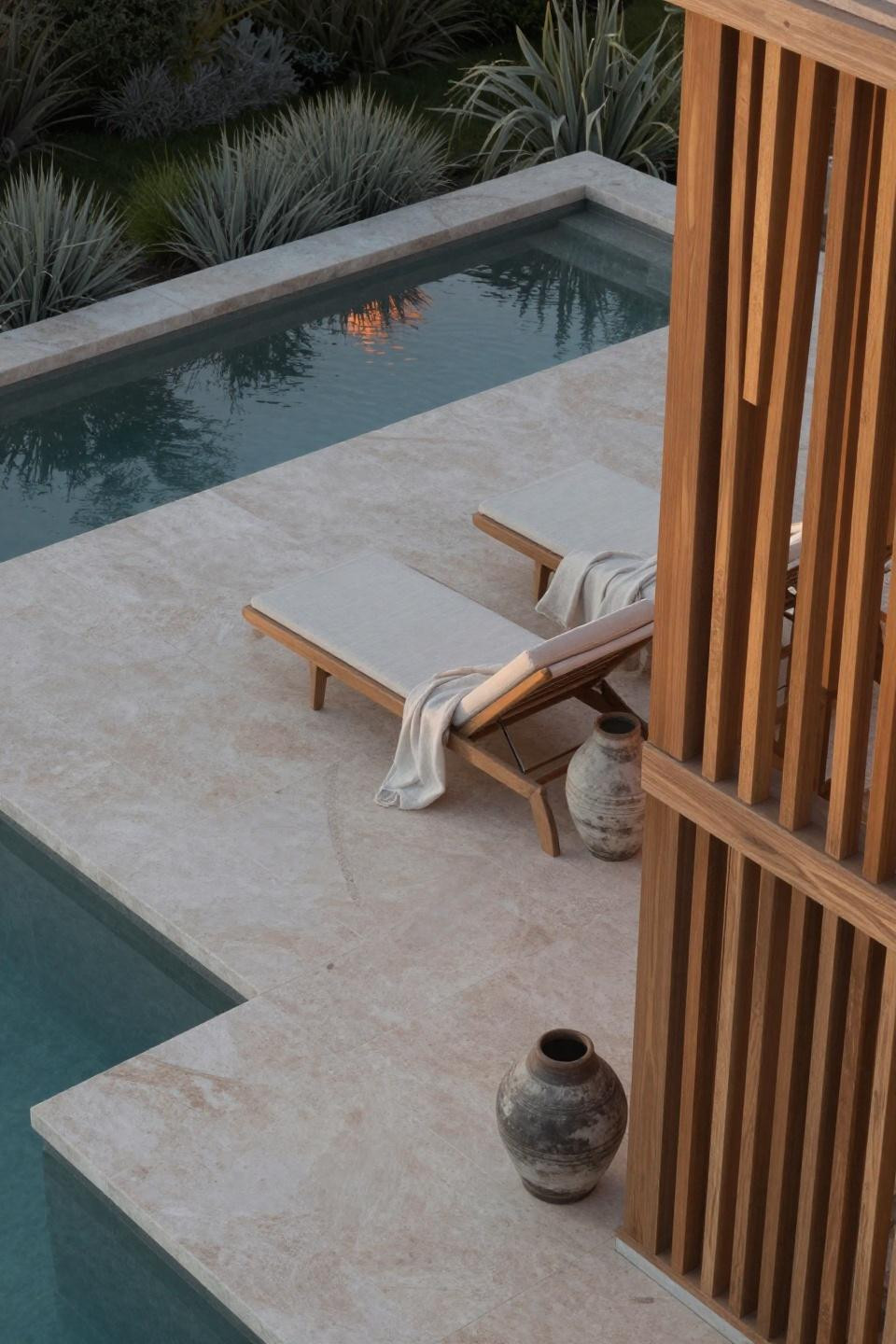 Backyard inspiration featuring travertine floating platform and limestone water channel