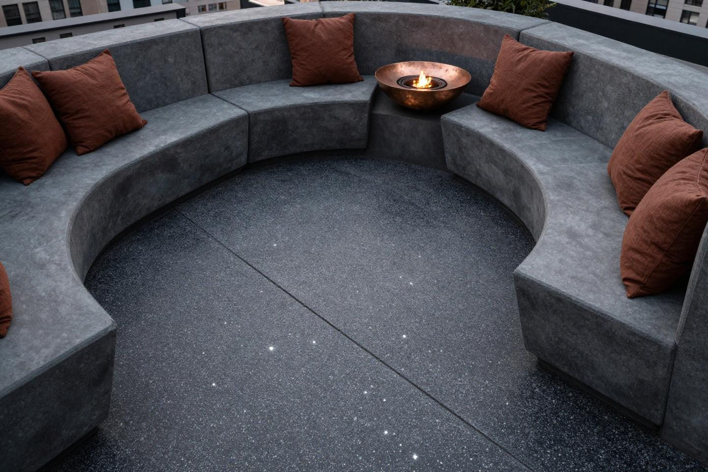 Backyard concrete patio designs with polished charcoal and white quartz aggregate