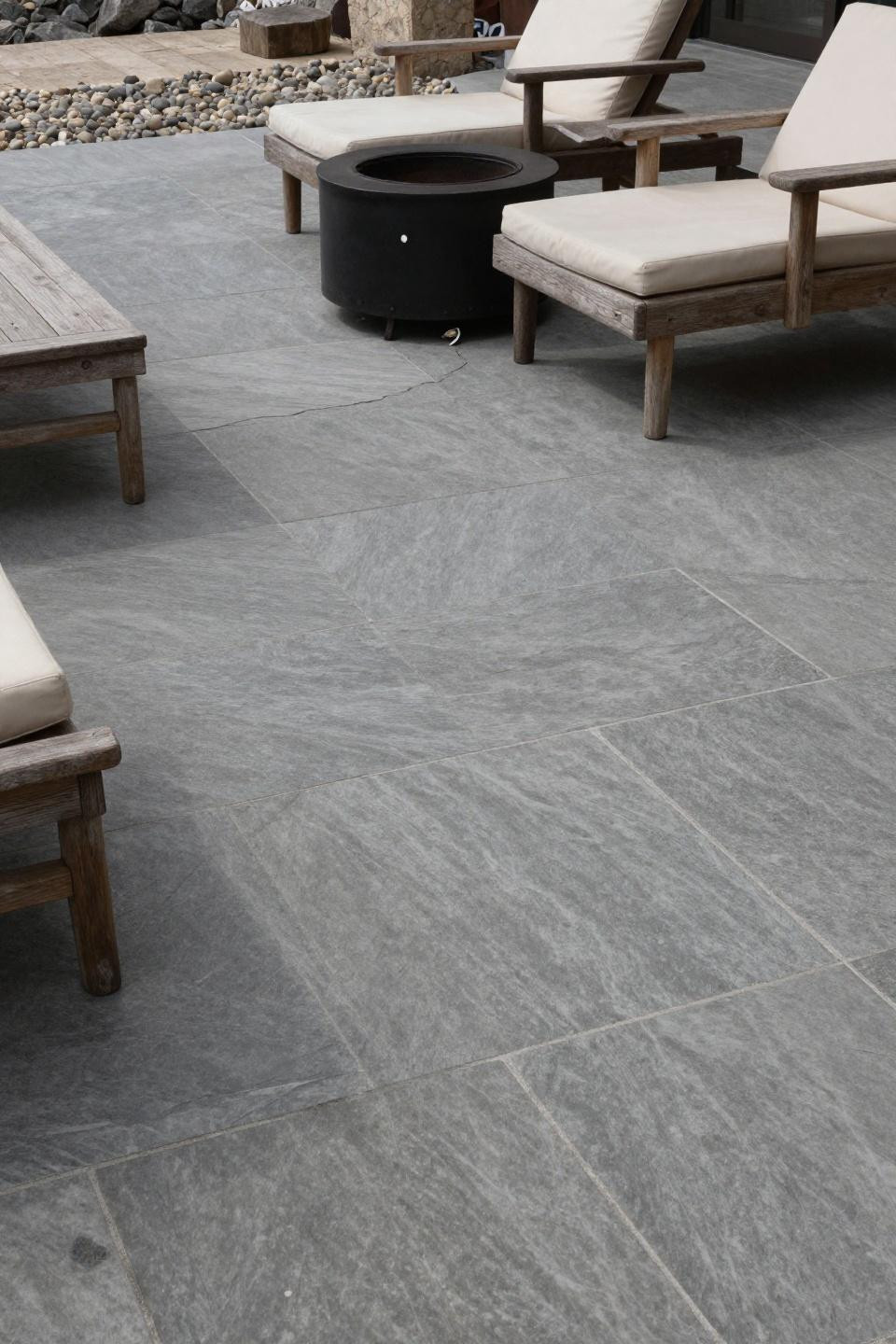 Cement patio ideas backyard with slate grey ashlar pattern and integrated fire pit