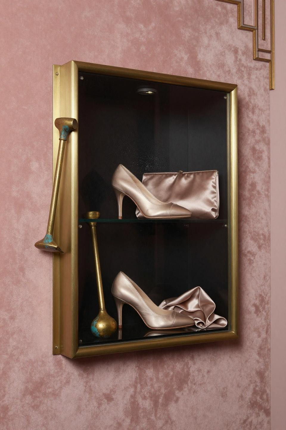 Shoe rack bench with art deco brushed brass frame and blackened glass shelves