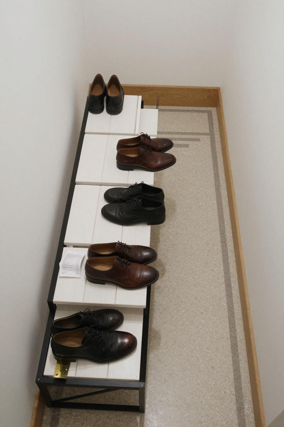 Front door shoe storage entryway with modular steel and oak bench system