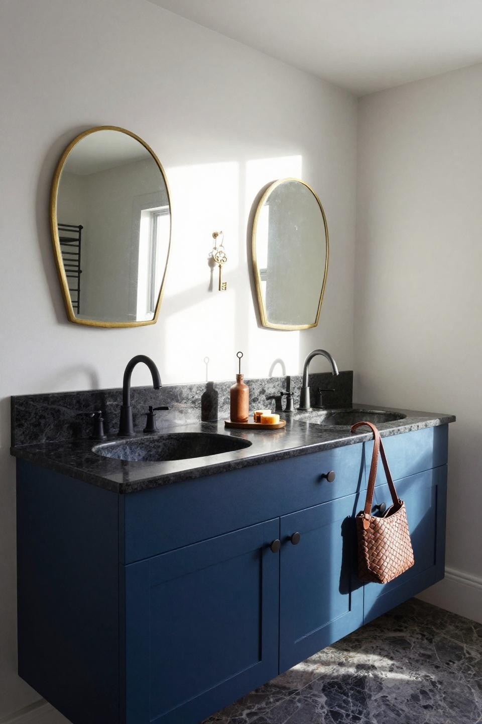 Dual sink bathroom ideas with midnight blue cabinets and black granite