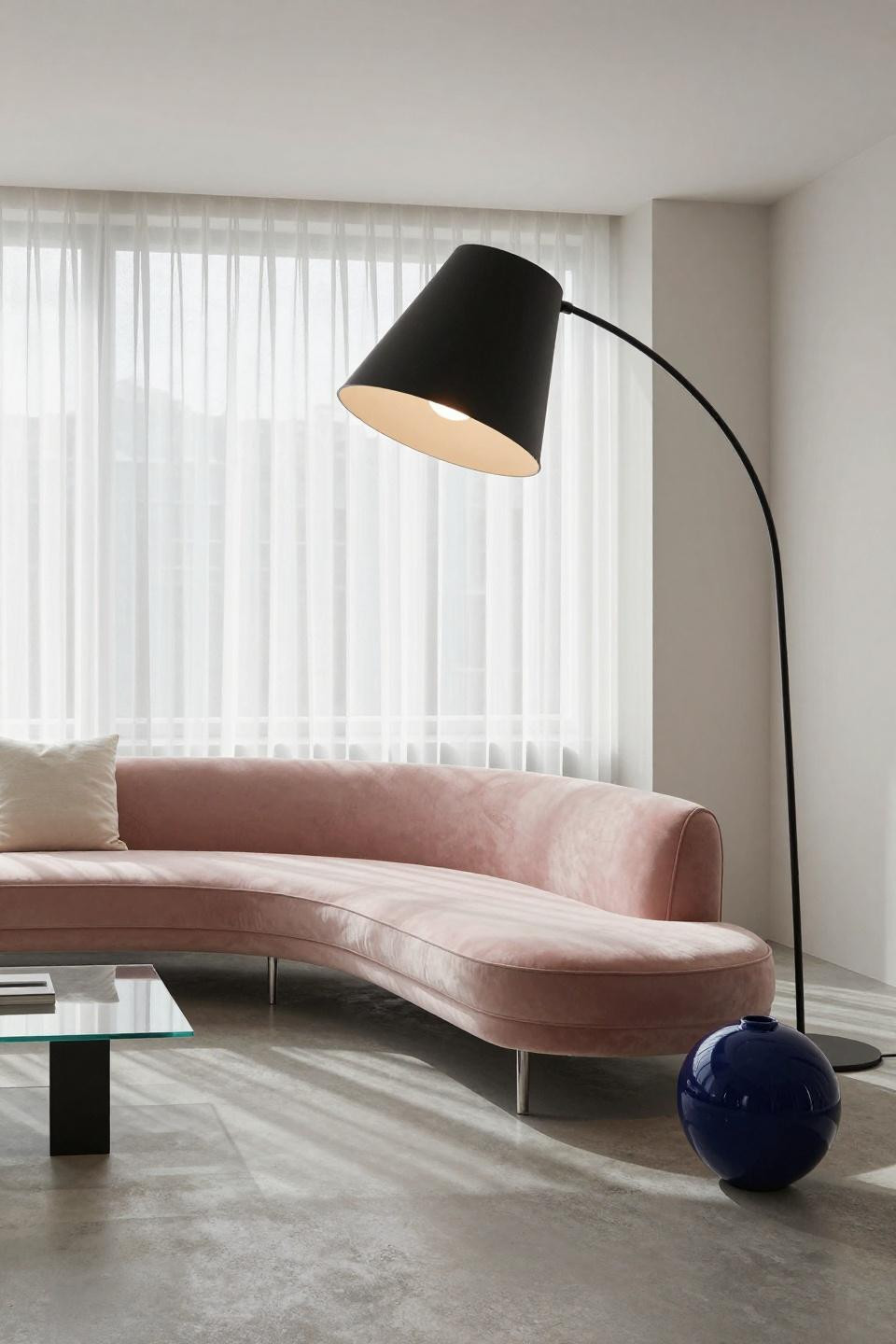 Aesthetic living room Bloxburg with blush velvet curved loveseat and minimalist geometric design