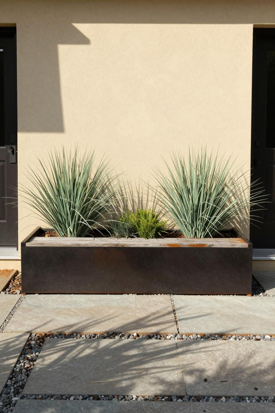 Small backyard landscaping with compact steel planters