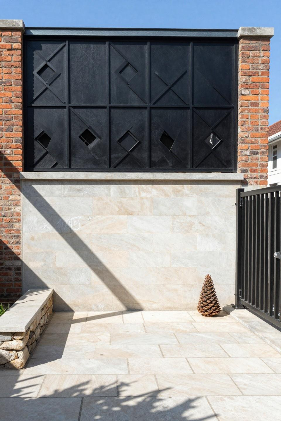 Contemporary horizontal slatted steel fence topper with diamond geometric cutout pattern