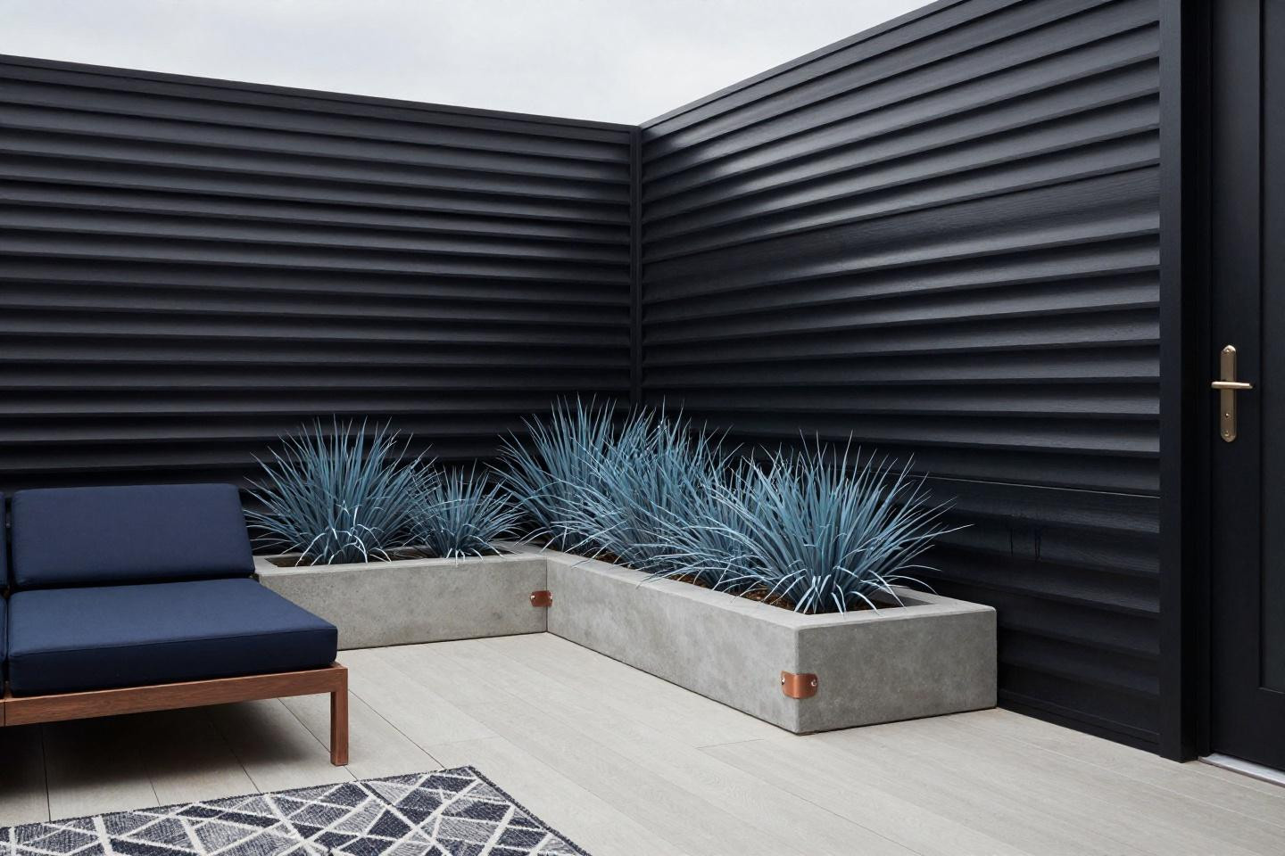 Privacy screen outdoor deck with matte charcoal-black aluminum slats