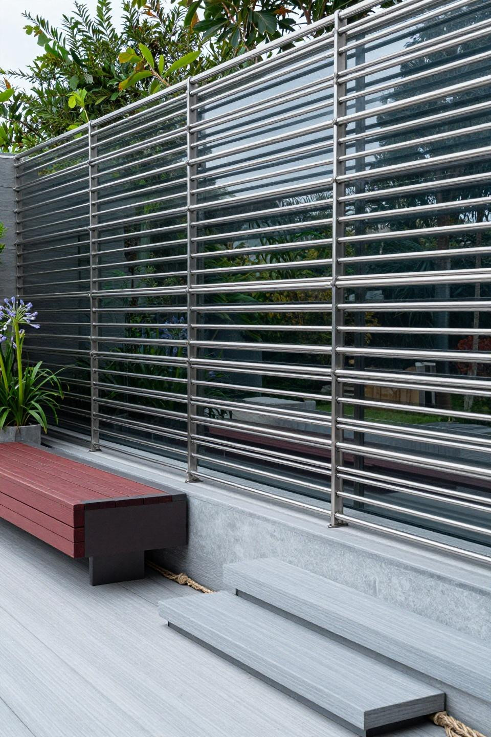 Decks with privacy walls using brushed stainless tension-cable system