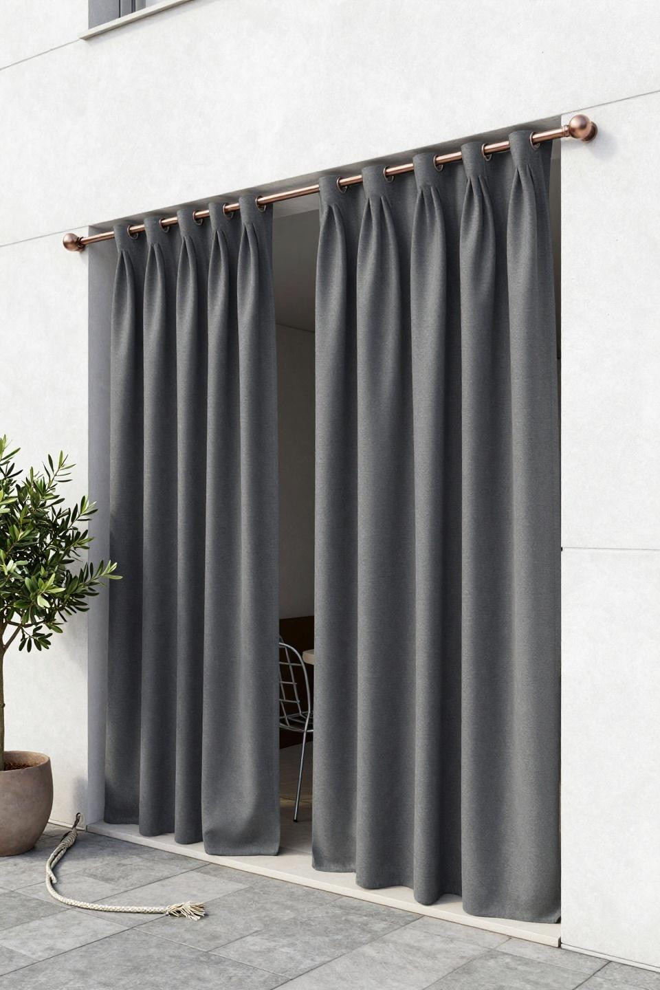 Balcony curtain ideas with charcoal fabric and copper hardware