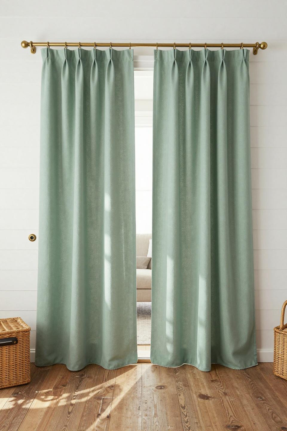 Balcony curtains outdoor in sage green with brass swing-arm rod