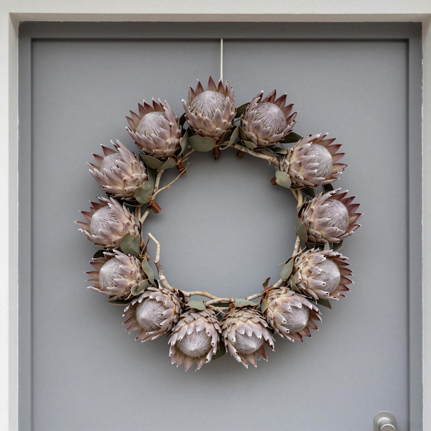 Spring wreaths for front door DIY with air-dried protea and birch branches