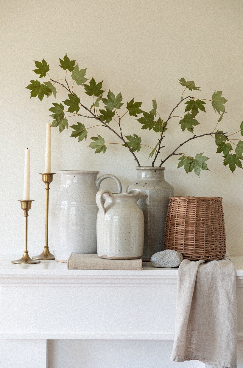 Cluster crockery jugs with maple branches
