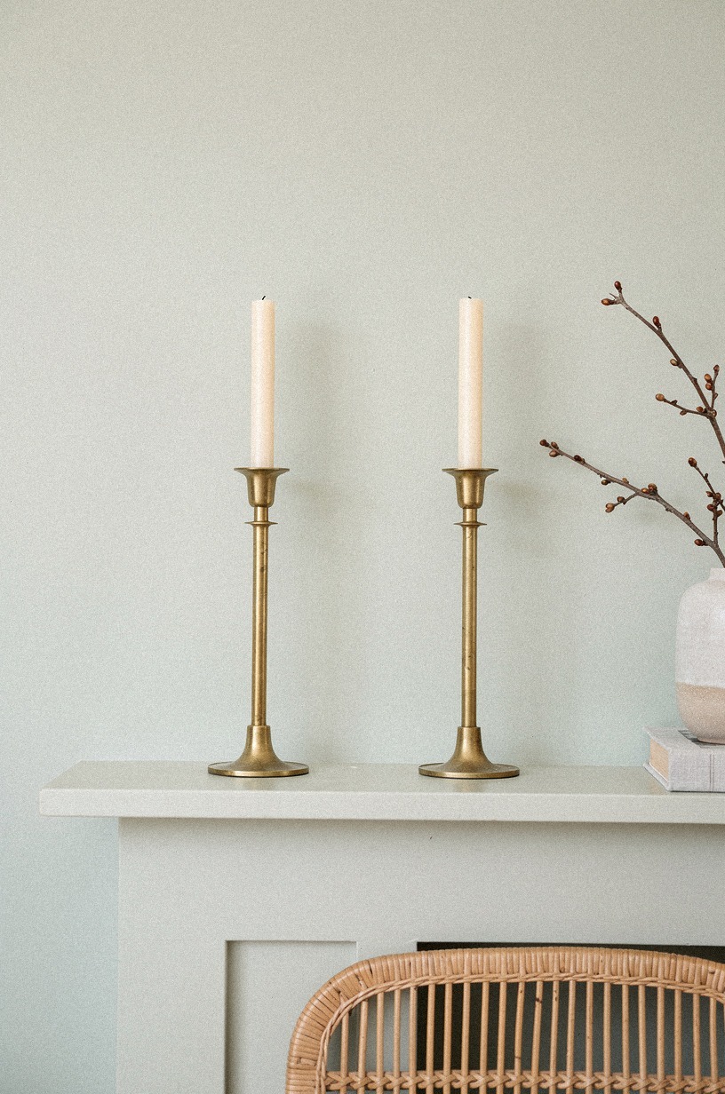 Build height with two brass candlesticks