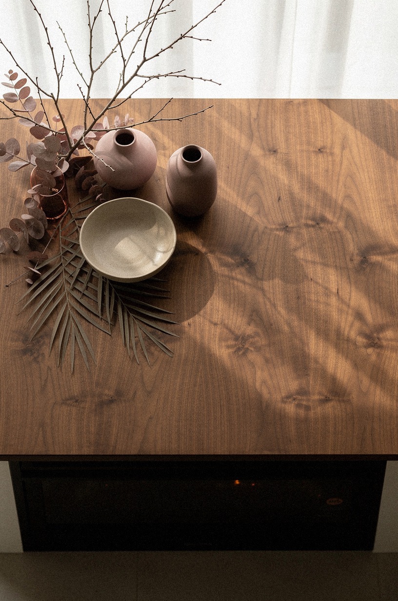 Layer taupe eucalyptus beneath sculptural branches