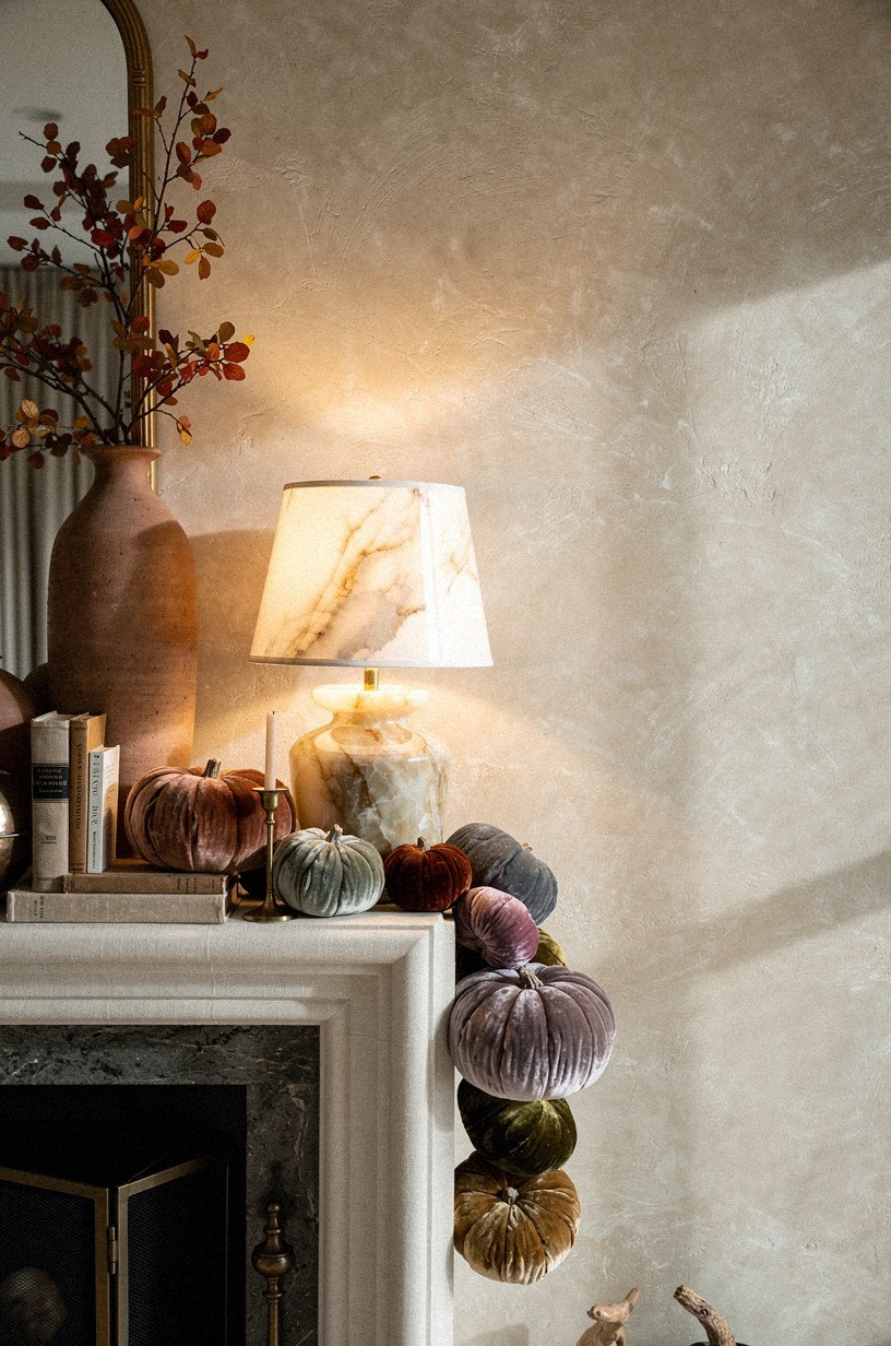 Cascade velvet pumpkins along one mantel corner