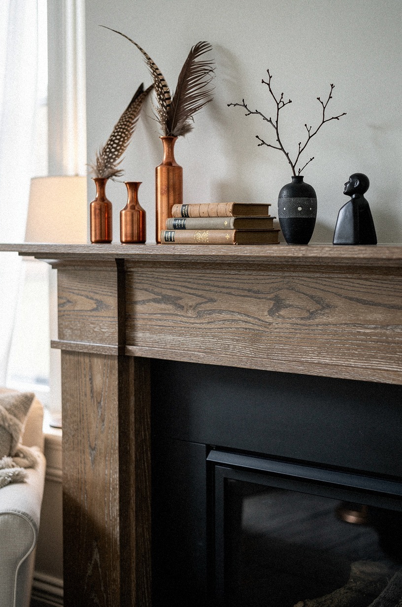 Tuck pheasant feathers into copper bud vases