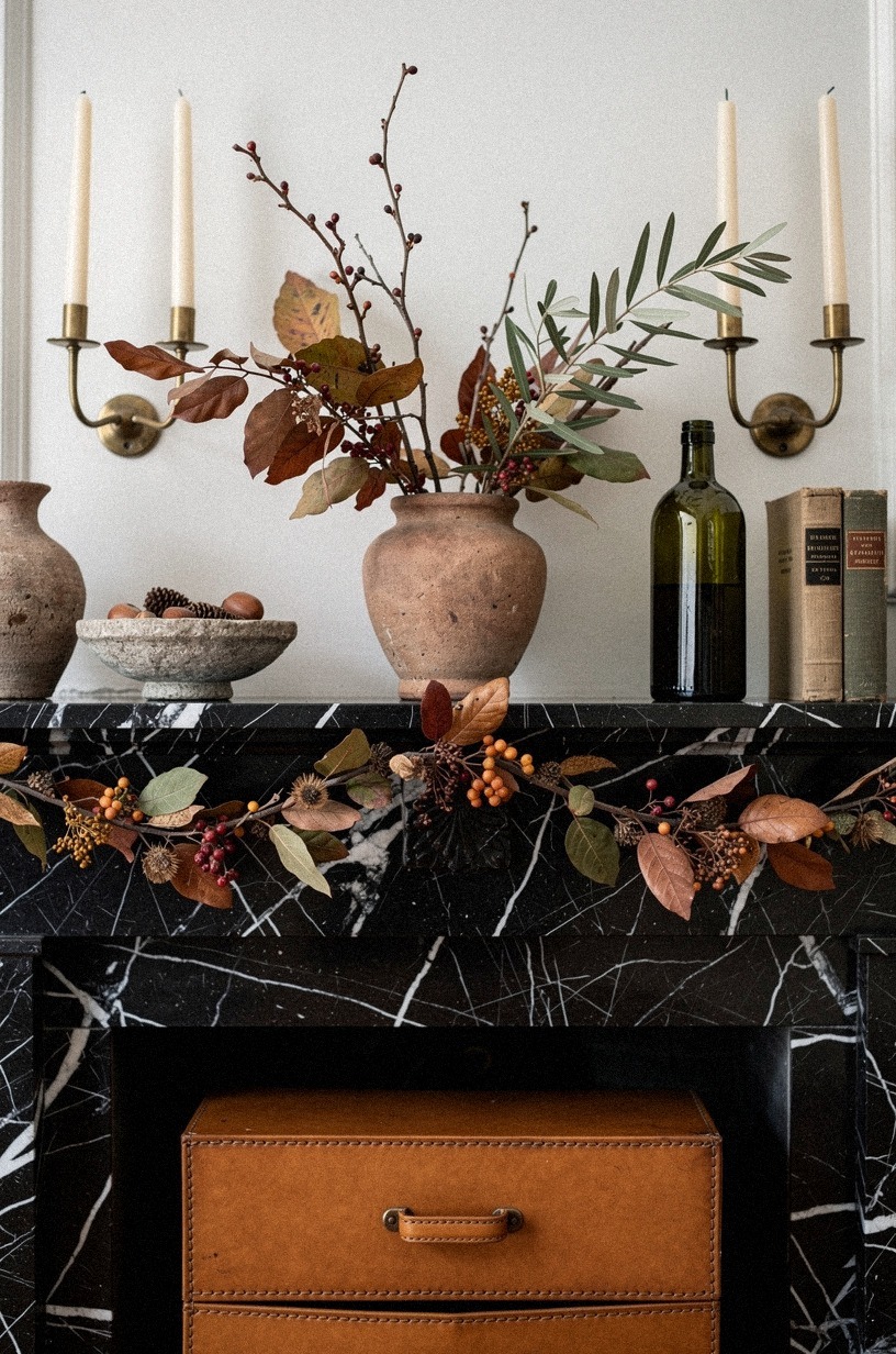 Hang a brass sconces pair beside garland