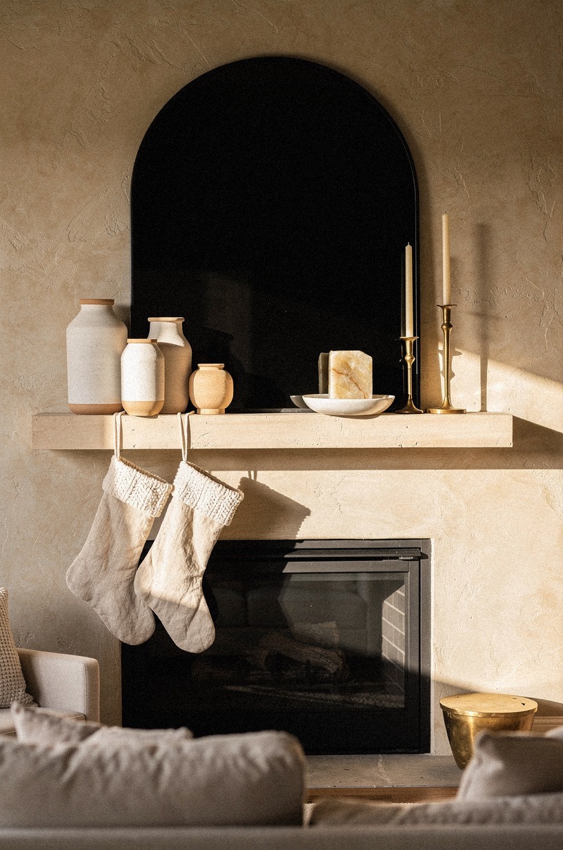 Anchor the center with a black arched mirror
