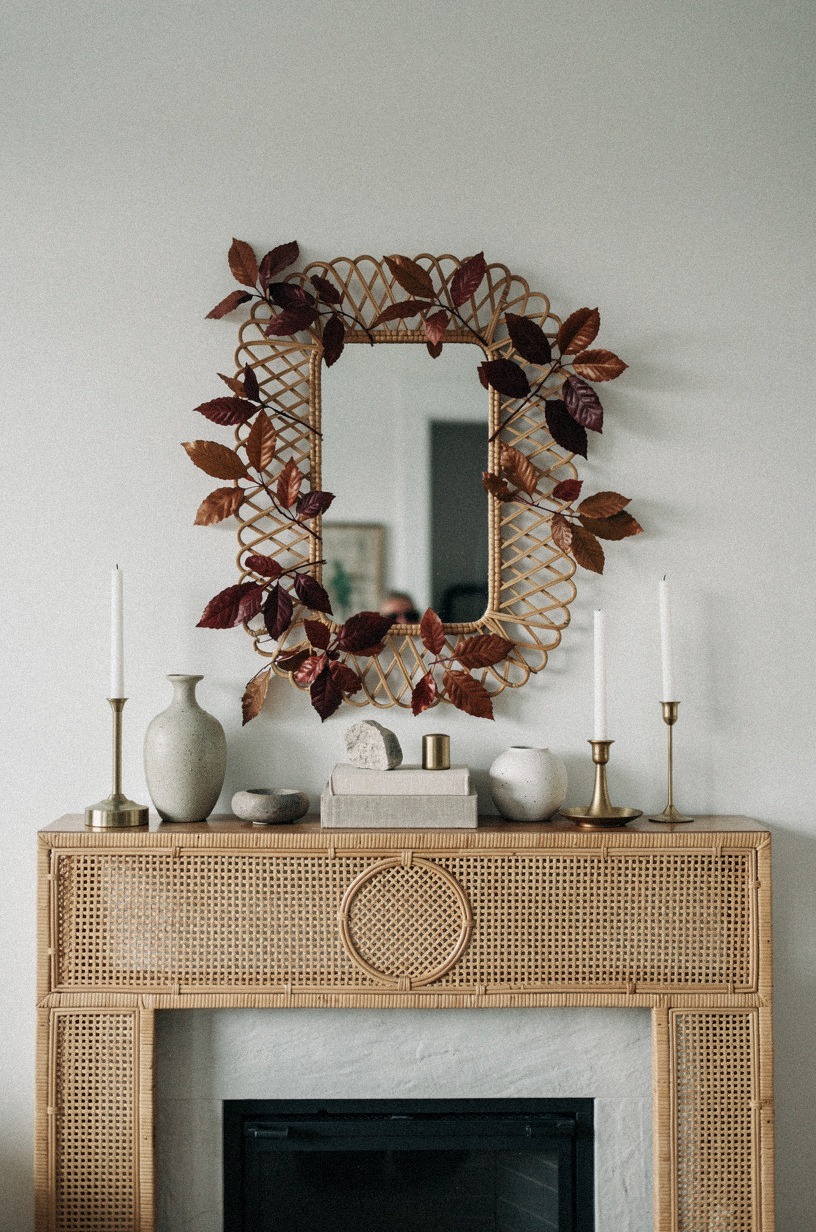 Tucked copper beech leaves behind the mirror