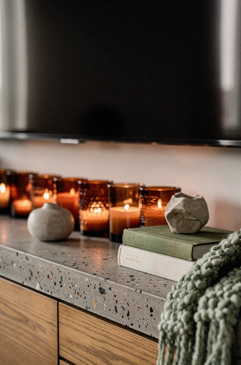 Repeat amber glass across the media console