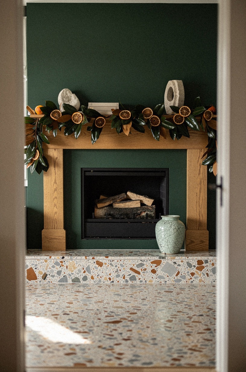 Tuck dried orange slices between magnolia leaves