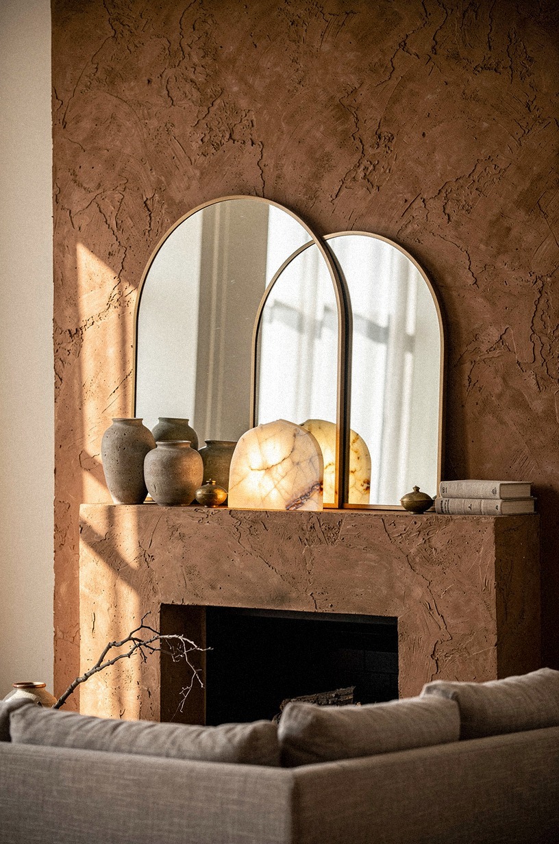 Overlap two arched mirrors at different heights (The Soft-Height Stack)