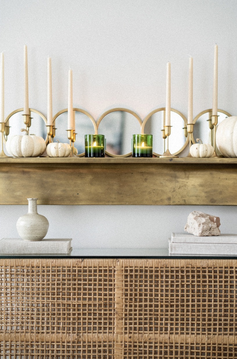 Tuck mini round mirrors between taper candles (The Little-Gleam Repeat)