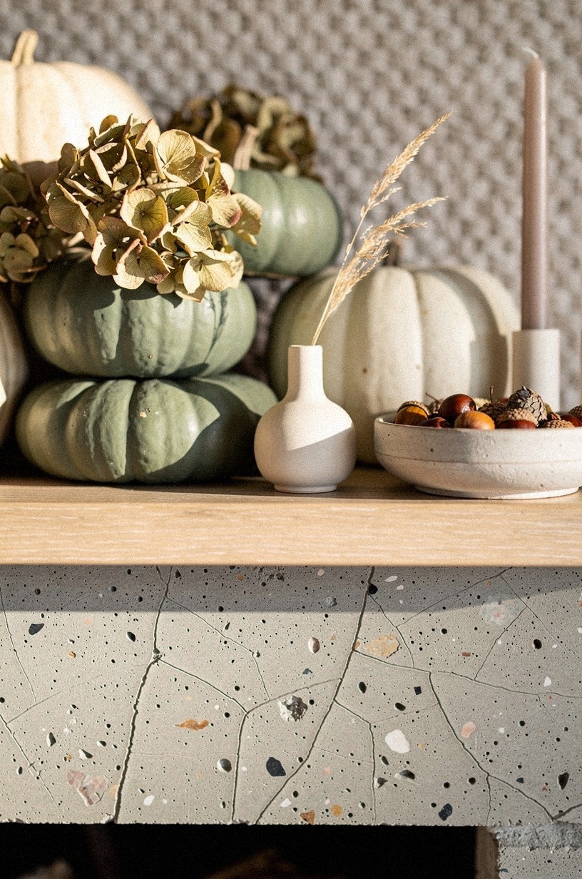 Tuck dried hydrangeas between pumpkin stacks for a softer line