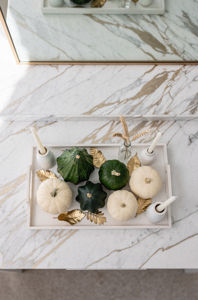 Place a harvest tray beneath the mirror to anchor everything