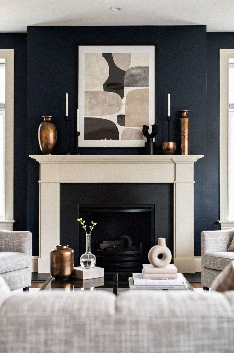 Repeat black accents across frames and candleholders (The Echo Rule)