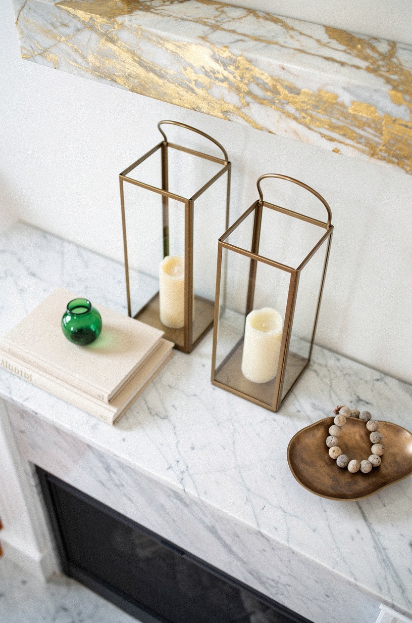 Style the hearth with oversized glass lanterns