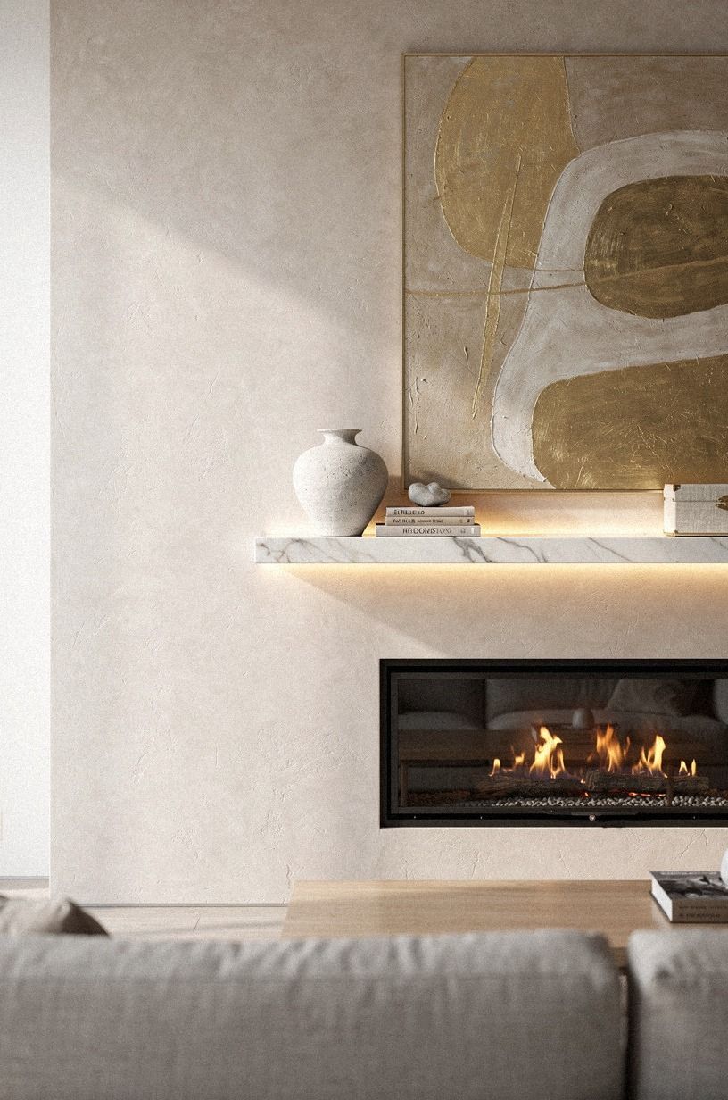 Hang one oversized abstract above the firebox