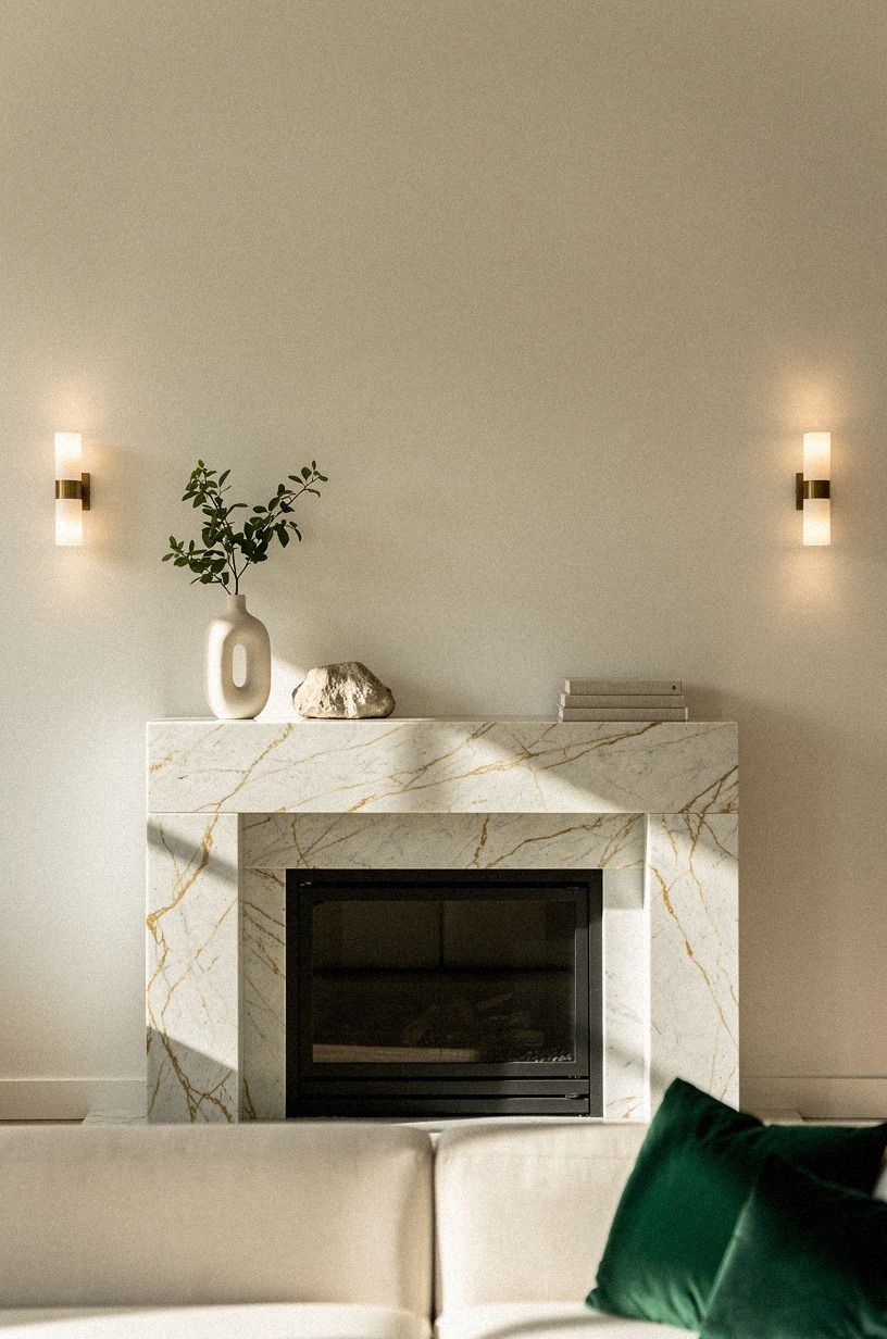 Finish with warm dimmable sconces at dusk