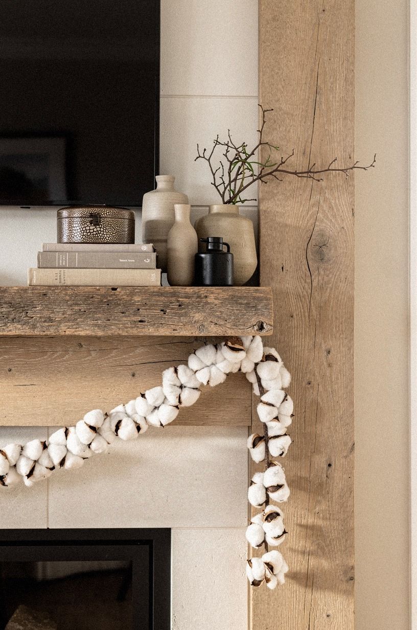 Drape cotton garland beneath reclaimed wood