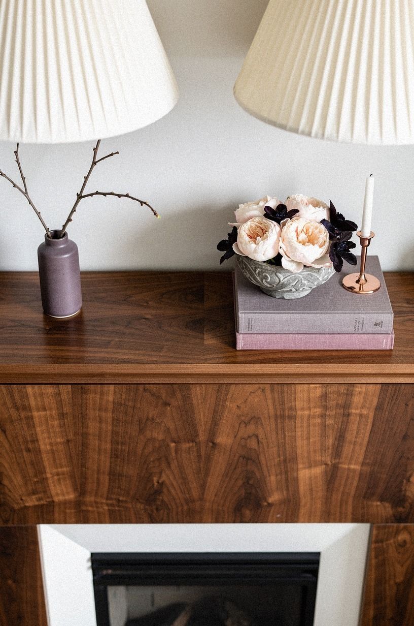 Flanked the mantel with pleated-shade sconces