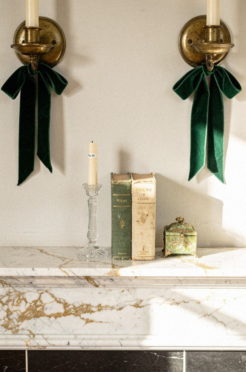 Style a velvet ribbon bow on sconces