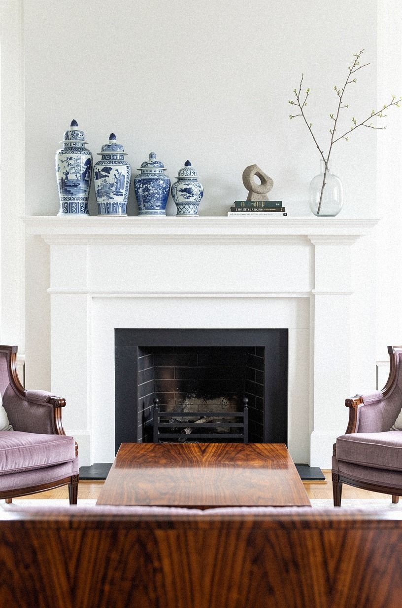 Layer blue porcelain jars across the shelf