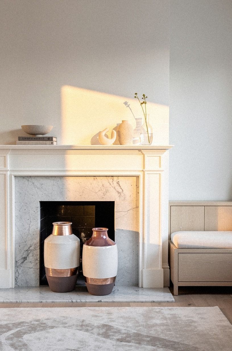 Ground the hearth with oversized ceramic vases