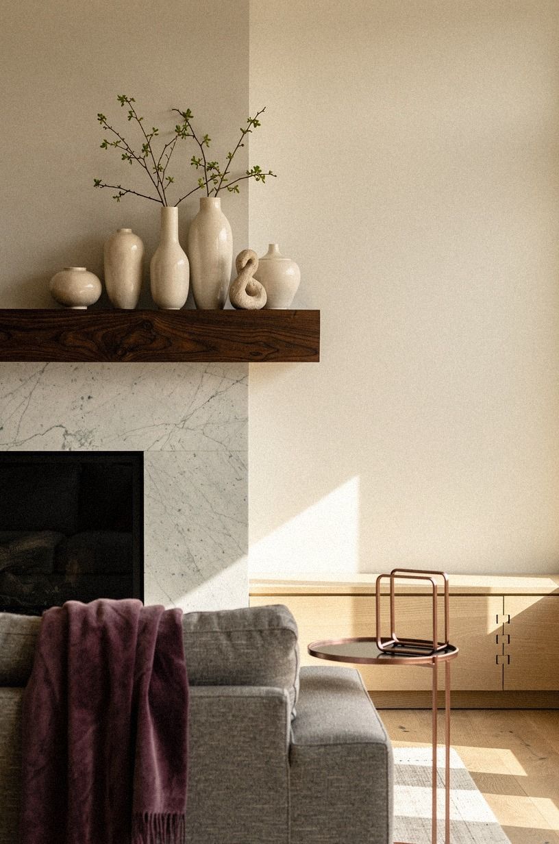 Pair dark wood with cream ceramic vessels