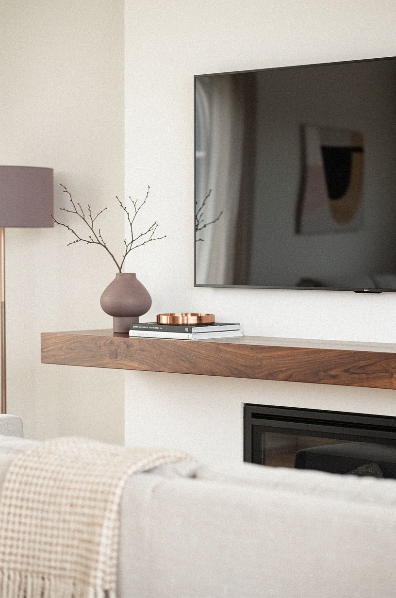 Center the mantel below the framed TV
