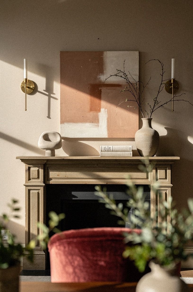 Mount narrow sconces beside the chimney breast