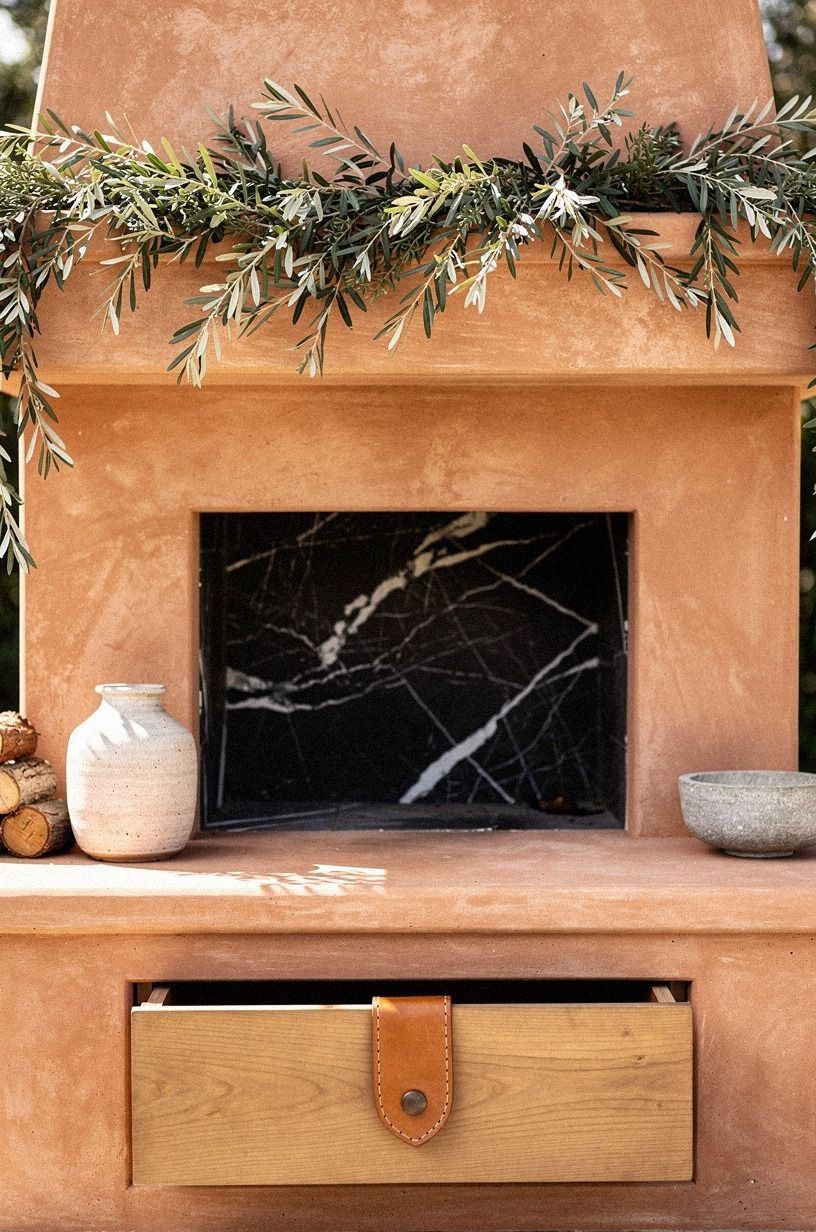Weave olive branches through the greenery