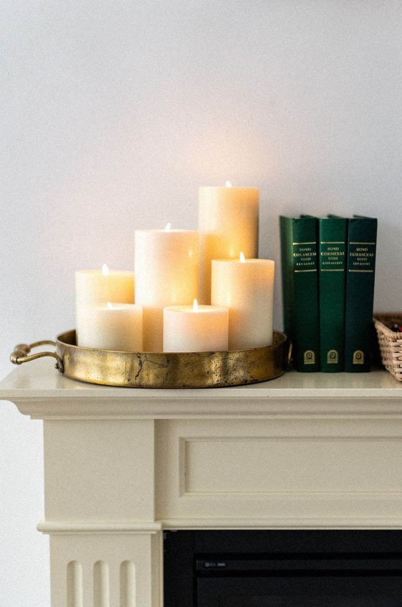 Nest ivory pillars on a vintage tray